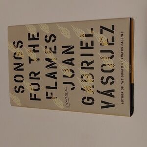 3/13 Songs For the Flames adult book by Juan Gabriel Vasquez 2021